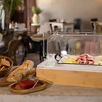 Ananda Hotel Boutique - Hoteles Cosmos